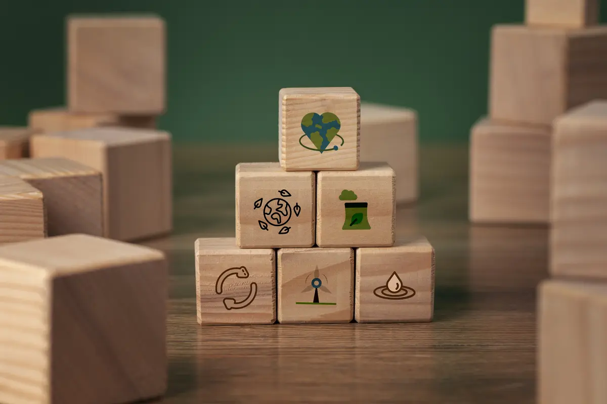 Building blocks with ESG related icons on. 